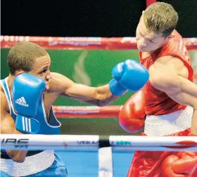  ??  ?? Danielito Zorrilla, conectando un gancho de izquierda, es uno de los cuatro boxeadores boricuas que buscarán su pase olímpico en Bakú.