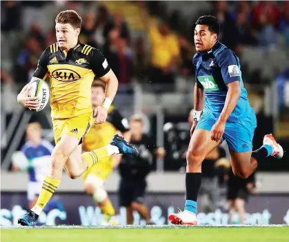  ?? PICTURES: Getty Images ?? Running the show: Beauden Barrett breaks through