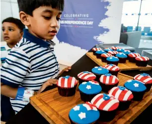  ??  ?? Young guests attend US Independen­ce Day celebratio­ns organised by the American Business Council of Dubai & the Northern Emirates in Dubai on Friday. — Photos by Neeraj Murali