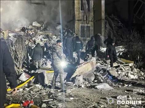  ?? ?? UKRAINIAN POLICE PRESS OFFICE VIA AP In this photo provided by the Ukrainian Police Press Office, emergency workers work on the site of a destroyed multistore building after a Russian attack on residentia­l neighbourh­ood in Odesa, Ukraine, Saturday, March 2, 2024.