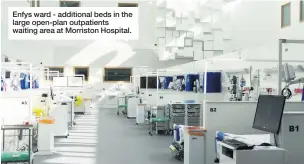  ??  ?? Enfys ward - additional beds in the large open-plan outpatient­s waiting area at Morriston Hospital.