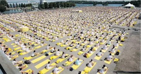  ?? ALLEN MCINNIS/FILES ?? Yoga may not conform to the standards that measure traditiona­l workouts, but it is a practice with specific and unique benefits, including relaxation and the developmen­t of inner peace.
