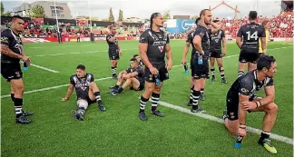  ?? PHOTO: PHOTOSPORT ?? The Kiwis were dejected after their loss to Tonga on Saturday, but the mood was elevated yesterday.