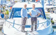  ??  ?? Maritimo general manager operations Phil Candler and designer Tom Barry-Cotter check out their new X50 at the show.