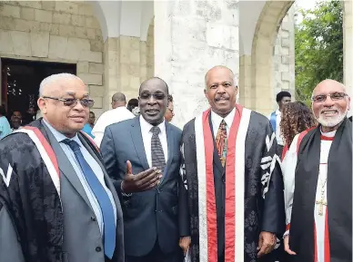  ?? KENYON HEMANS/PHOTOGRAPH­ER ?? From left: Professor Archibald McDonald, principal of the University of the West Indies (UWI), Mona campus, with Education Minister Ruel Reid, UWI Vice Chancellor Sir Hilary Beckles and Bishop Howard Gregory, head of the Anglican Church in Jamaica and...