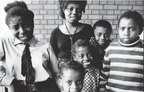  ??  ?? Undated photo of Buchi Emecheta (c) with her five children