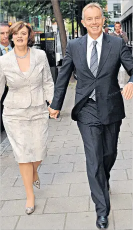  ?? STEFAN ROUSSEAU/PA WIRE ?? Mr Blair and his wife Cherie, who quit her role as human rights barrister to focus on Omnia Strategy