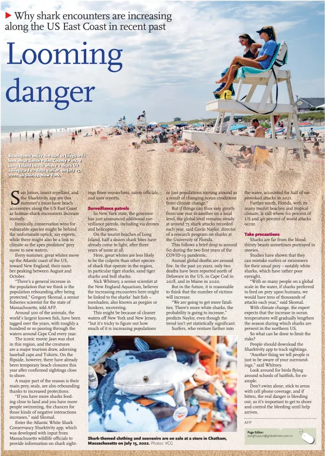  ?? Photos: VCG ?? xx
Beachgoers enjoy the surf as lifeguards look on at Smith Point County Park, a Long Island beach where a shark bit a lifeguard 10 days earlier, on July 15, 2022, in Shirley, New York.
Shark- themed clothing and souvenirs are on sale at a store in Chatham, Massachuse­tts on July 15, 2022.