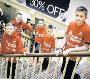  ??  ?? Pictured at Arighi Bianchi are (from left) George Mathias, 10, director Nick Bianchi, Lucy Roberts, 12, James Mathias, six, and Sam Roberts, 10. Inset: Team George wound their way around the furniture store for the challenge