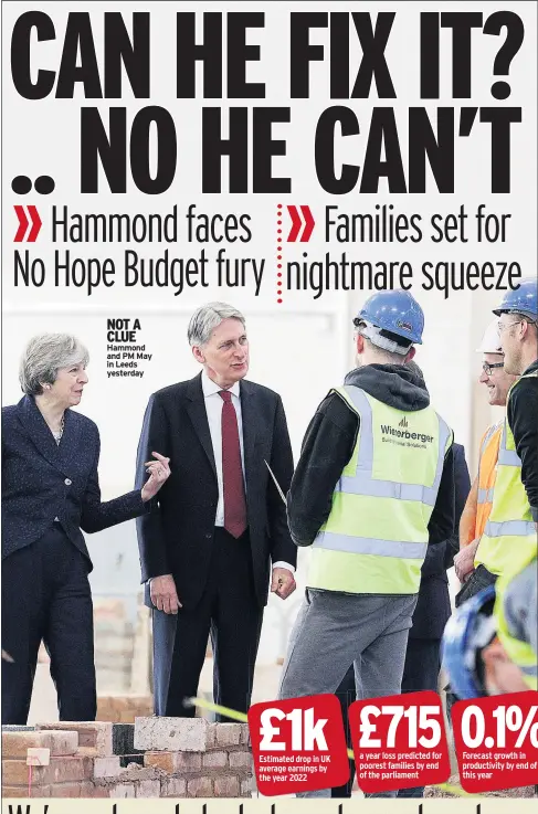  ??  ?? NOT A CLUE Hammond and PM May in Leeds yesterday