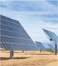  ??  ?? A field of photovolta­ic solar panels providing alternativ­e green energy.