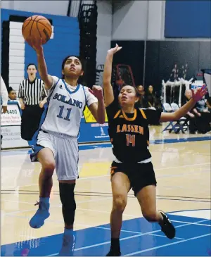  ?? CHRIS RILEY — TIMES-HERALD FILE ?? Solano College’s Ashmeen Sran goes up for a shot in a 65-73 loss to Lassen in the first round of the Solano Showdown in 2019. Sran wasn’t able to play her sophomore season at Solano.