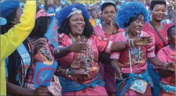  ??  ?? Supporters of ruling Democratic Progressiv­e Party (DPP) dance during the final elections campaign rally at Mjamba Park in Blantyre yesterday.