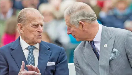  ??  ?? The late Prince Philip (left), in an earlier photo with his son Charles, the Prince of Wales.