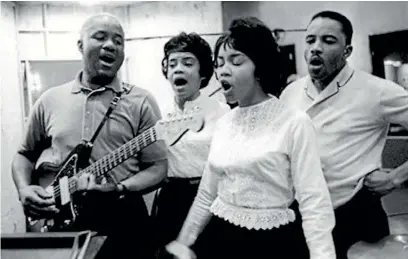  ??  ?? The Staples Singers in the studio in the 1960s, from left, Pops, Cloetha, Mavis and Pervis.