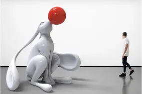  ??  ?? \\White dreamer with red ball s8 e01. aluminium casting. limited edition 1\150. 350 cm h.