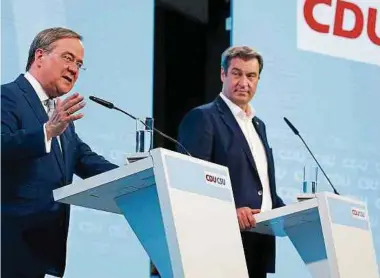  ?? Foto: AFP ?? CDU-Chef Armin Laschet (links) und sein CSU-Kollege Markus Söder haben das gemeinsame Wahlprogra­mm vorgestell­t.