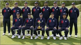  ?? CHARLIE NEIBERGALL — THE ASSOCIATED PRESS ?? Team USA poses for a picture on the 18th hole during a practice day at the Ryder Cup at the Whistling Straits Golf Course Wednesday in Sheboygan, Wis.