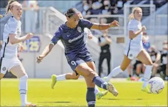  ?? Rick Bowmer / Associated Press ?? north Carolina Courage forward Lynn Williams takes a shot during the first half of an NWSL Challenge Cup soccer match against the Portland thorns on Saturday.