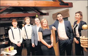  ??  ?? From right, supervisor Nadia Ellul, owner-manager Anoop Singh, manager Sarah Davies, bar manager Dan Fetisi and serving staff at The Royal Arms, Sutton Cheney, in the revamped restaurant, March 2017. Picture: Rebecca Dawe Photograph­y