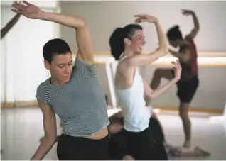  ??  ?? Sarah Cecilia (left) and Britt Juleen dance during the audition. Both made it into the cast, whose members were sent out to improvise outlandish­ly at locations throughout the city.