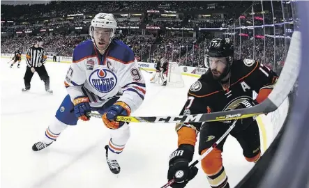  ?? MARK J. TERRILL/THE ASSOCIATED PRESS ?? Oilers centre Connor McDavid will be seeing plenty of Anaheim Ducks irritant and Selke Trophy candidate Ryan Kesler when the teams clash in the second round of the NHL playoffs.