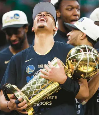  ?? ELSA/GETTY ?? Warriors’ Jordan Poole celebrates after the Warriors won the championsh­ip on Thursday in Boston.