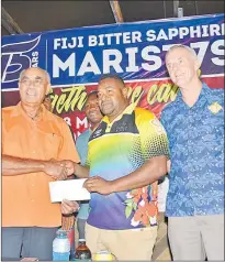  ?? Picture: SOPHIE RALULU ?? Raiwasa 7s team manager Seba Vulakoro, middle, receives a cheque from Paradise Beverages Fiji general manager and corporate affairs Joseph Rodan Sr and Paradise Beverages Ltd general manager Mike Spence during the launch of the 2021 Fiji Bitter Sapphire Marist 7s tournament on Wednesday.