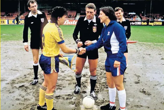  ?? ?? Hall of famer: England captain Carol Thomas (above, right) before the first leg of the 1984 European nations championsh­ip final against Sweden; (below) at her football-themed wedding