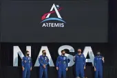  ?? JOHN RAOUX — THE ASSOCIATED PRESS ?? Five of the astronauts who will be part of the Atremis missions, from left, Jessica Meir, Joe Acaba, Anne McClain, Matthew Dominick and Jessica Watkins are introduced by Vice President Mike Pence during the eighth meeting of the National Space Council at the Kennedy Space Center in Cape Canaveral, Fla., on Wednesday.