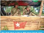  ?? — AFP photos ?? This photo taken on Dec 9, 2023 shows female members of the Mandalay People’s Defense Forces (MDYPDF) standing guard at their base camp.