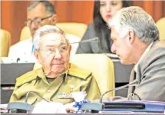  ??  ?? Castro (left) talks with Diaz-Canel during the year-end parliament­ary session at the Convention Palace in Havana. — AFP photo