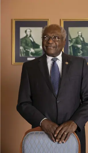  ??  ?? Representa­tive James E. Clyburn of South Carolina. Behind him are portraits of congressio­nal
predecesso­rs Joseph Rainey and Robert
De Large.