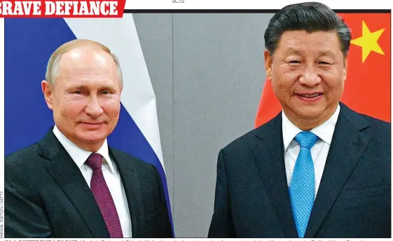  ?? ?? IN A DIFFERENT LEAGUE: Vladimir Putin and China’s Xi Jinping, who heads a regime far more brutal than Moscow’s, at the Beijing Winter Olympics