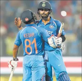  ??  ?? Virat Kohli (right) and Kedar Jadhav added 200 runs for the fifth wicket on Sunday AP