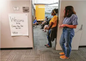  ?? Steve Gonzales / Staff photograph­er ?? Other teens listen in during the Sunrise Movement town hall. One of the main goals of the volunteer- and donation-powered grass-roots organizati­on is to promote the Green New Deal.