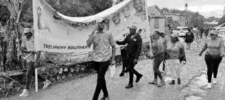  ?? ?? Liston Wauchope (foreground), the Jamaica Labour Party candidate for the Ulster Spring division in Trelawny Southern, arrives at the nomination centre in Albert Town.