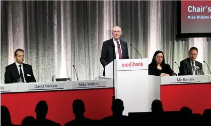 ?? Photograph: Morgan Hancock/AAP ?? Medibank chair Mike Wilkins (speaking) and CEO David Koczkar (left) defended the company’s decision not to pay a ransom to the hackers.
