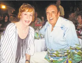  ?? John Berger / Associated Press ?? In this June 12, 2015, file photo, Jim Nabors and his friend and longtime collaborat­or in comedy Carol Burnett celebrate Nabors’ 85th birthday at his home in Honolulu. Nabors died peacefully at his home in Honolulu on Thursday with his husband Stan...