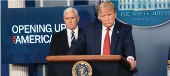  ?? Joyce N. Boghosian White House photo ?? U.S. President Donald Trump joined by Vice President Mike Pence at the daily White House briefing on COVID-19 at the April 16 announceme­nt of the states gradually ending the lockdown and re-opening for business.