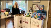  ?? COURTESY OF ZUBER REALTY ?? Nancy Sillitti with some of the toys donated to Zuber Realty’s Toys for Tots campaign.