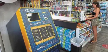  ?? — AFP ?? Increased oversight: A cryptocurr­ency ATM is seen in a convenienc­e store in Miami, Florida. Calls for a legislativ­e fix have grown louder in the United States in the wake of the spectacula­r crash of Terrausd.