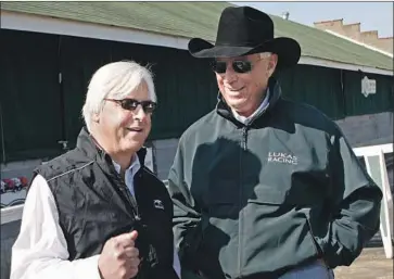  ?? Ed Reinke Associated Press ?? BOB BAFFERT, left, and Wayne Lukas will be looking for a record-tying seventh victory in the Preakness Stakes on Saturday. After some early friction, the two Hall of Famers have a lot of respect for each other.