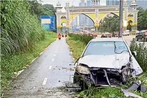  ??  ?? Another tragedy: The driver of this vehicle, believed to have been driving under influence, has been detained following a fatal accident at the Federal Highway on Friday.