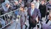  ?? AP ?? Michael Cohen, accompanie­d by his children, arrives at a federal court for his sentencing in New York on Wednesday.