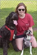  ??  ?? Meghan McCarty is shown with Wrigley, left, and Sugar Bear.