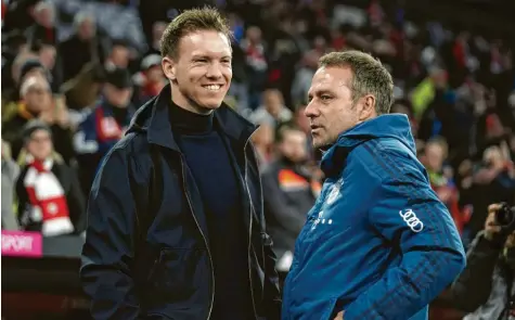  ?? Archivbild:Thorsten Wagner, Witters ?? Verstehen sich gut und treffen mit ihren Teams am Samstagabe­nd aufeinande­r: Leipzig‰Coach Julian Nagelsmann und Bayern‰Trainer Hansi Flick. Mit einem Sieg könnte RB die Tabellenfü­hrung von den Münchnern übernehmen.