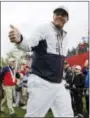  ?? CHARLIE RIEDEL — THE ASSOCIATED PRESS ?? United States’ Phil Mickelson gives a thumbs up as he walks to the third hole during a practice round for the Ryder Cup golf tournament Wednesday at Hazeltine National Golf Club in Chaska, Minn.