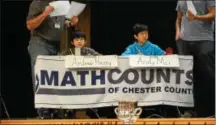  ??  ?? Tredyffrin/Easttown Middle School teammates Andrew Huang, left, and Andy Mei, right, compete. Their team of four won the Chester County MathCounts competitio­n for the third consecutiv­e year. As individual­s, Huang placed first and Mei placed second. The...