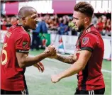  ?? CURTIS COMPTON / CCOMPTON@AJC.COM ?? Hector Villalba (right, with Darlington Nagbe) tore through the Red Bulls defense Sunday. On the field for just 21 minutes, he took three shots and scored in the 3-0 win.